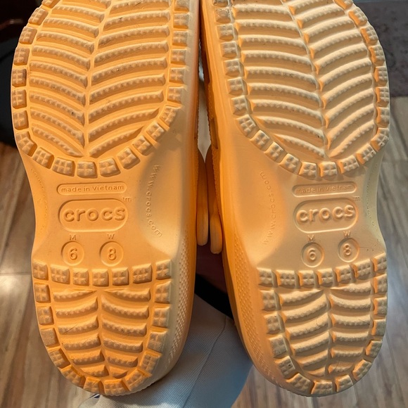 I am selling orange crocs, size 8 women’s, condition 9/10 and clean - Picture 2 of 3